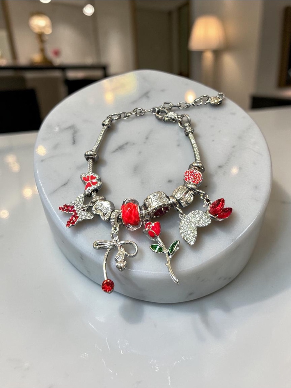 Silver Charm Bracelet with Red Floral and Crystal Accents